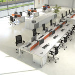 large open office with rows of workstations